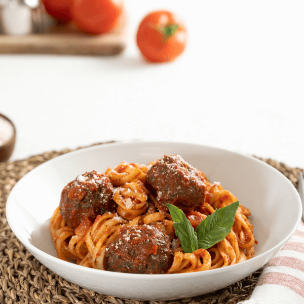 Close up of fresh linguine with meatballs and Farm Boy Sugo di Pomodoro Tomato Sauce.