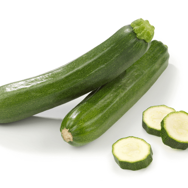 Two whole zucchini and three zucchini coins.