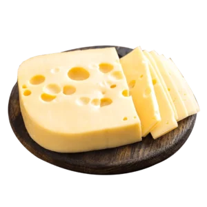 Slices of Swiss Cheese on a board. 