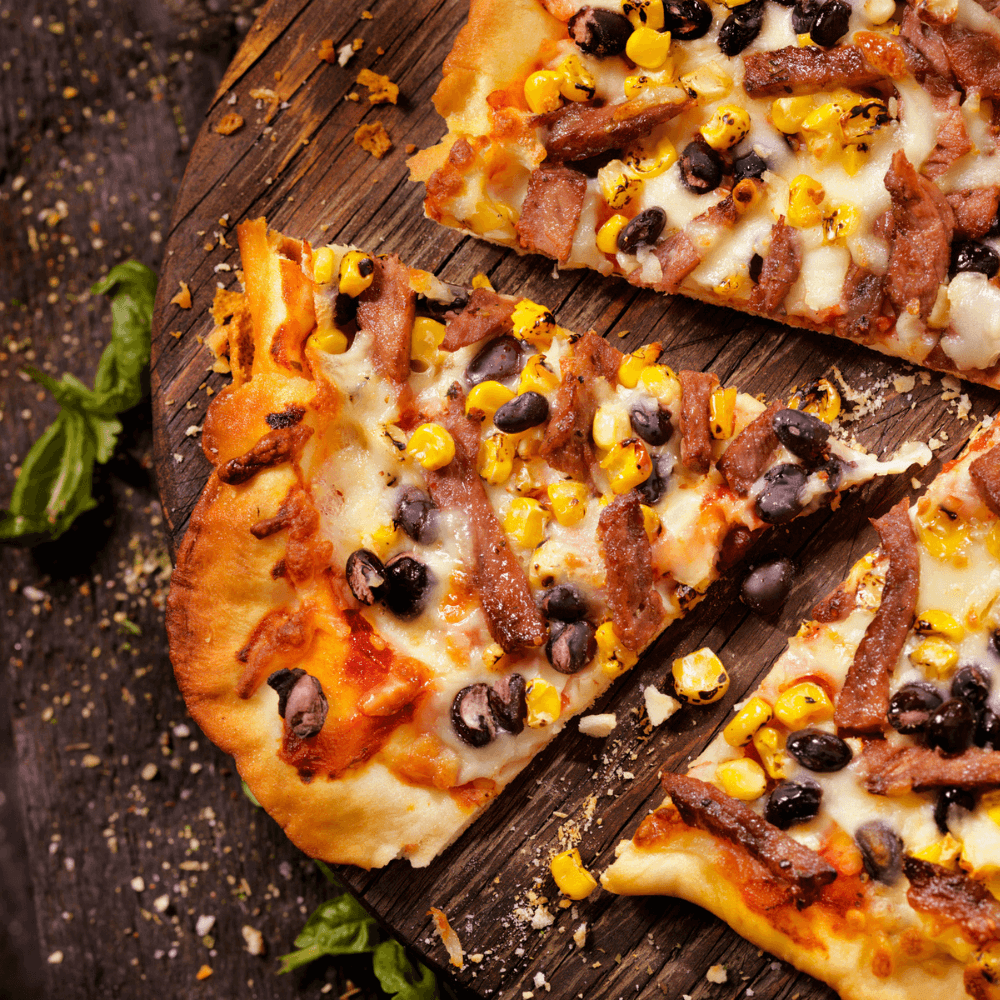 Southwestern steak pizza with corn and black beans.