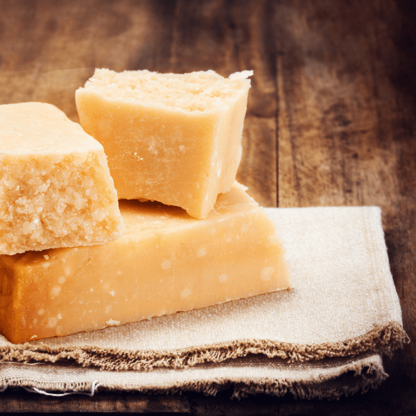 hunks of Parmesan cheese on linen napkin