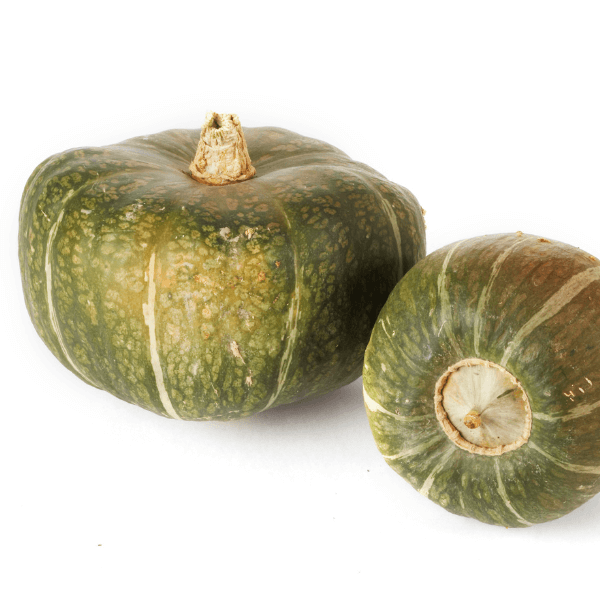 Two whole buttercup squashes on white background.