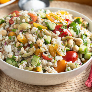 Enjoy a refreshing and satisfying Mediterranean Barley and Chickpea Salad, packed with wholesome ingredients that make it both delicious and versatile.