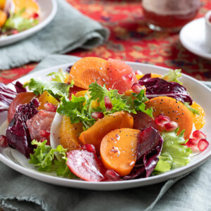 Elevate your table with our Persimmon, Beet, and Radicchio Salad! Featuring roasted beets, juicy citrus, crisp greens, and Farm Boy™ Red Wine Vinaigrette, it's a vibrant, flavour-packed dish perfect for any occasion.